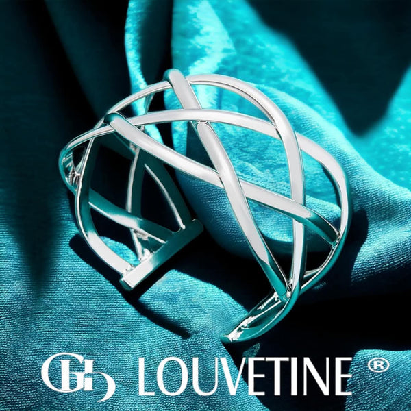 THEA OPEN CROSS BANGLE